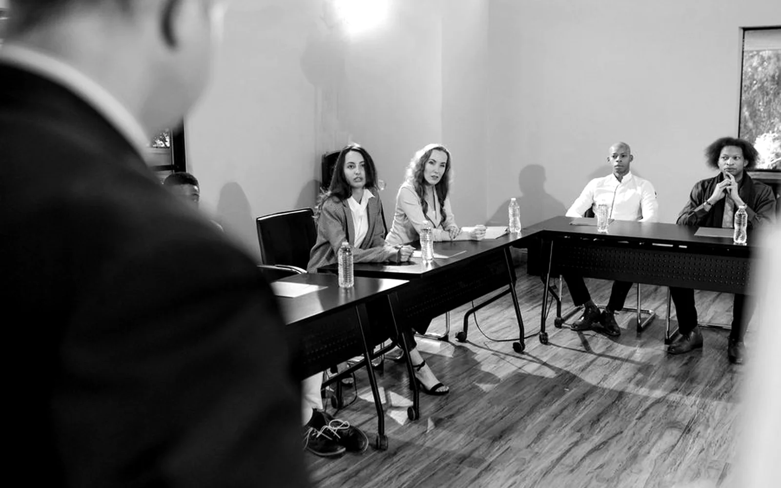Meeting workshop room with attendees