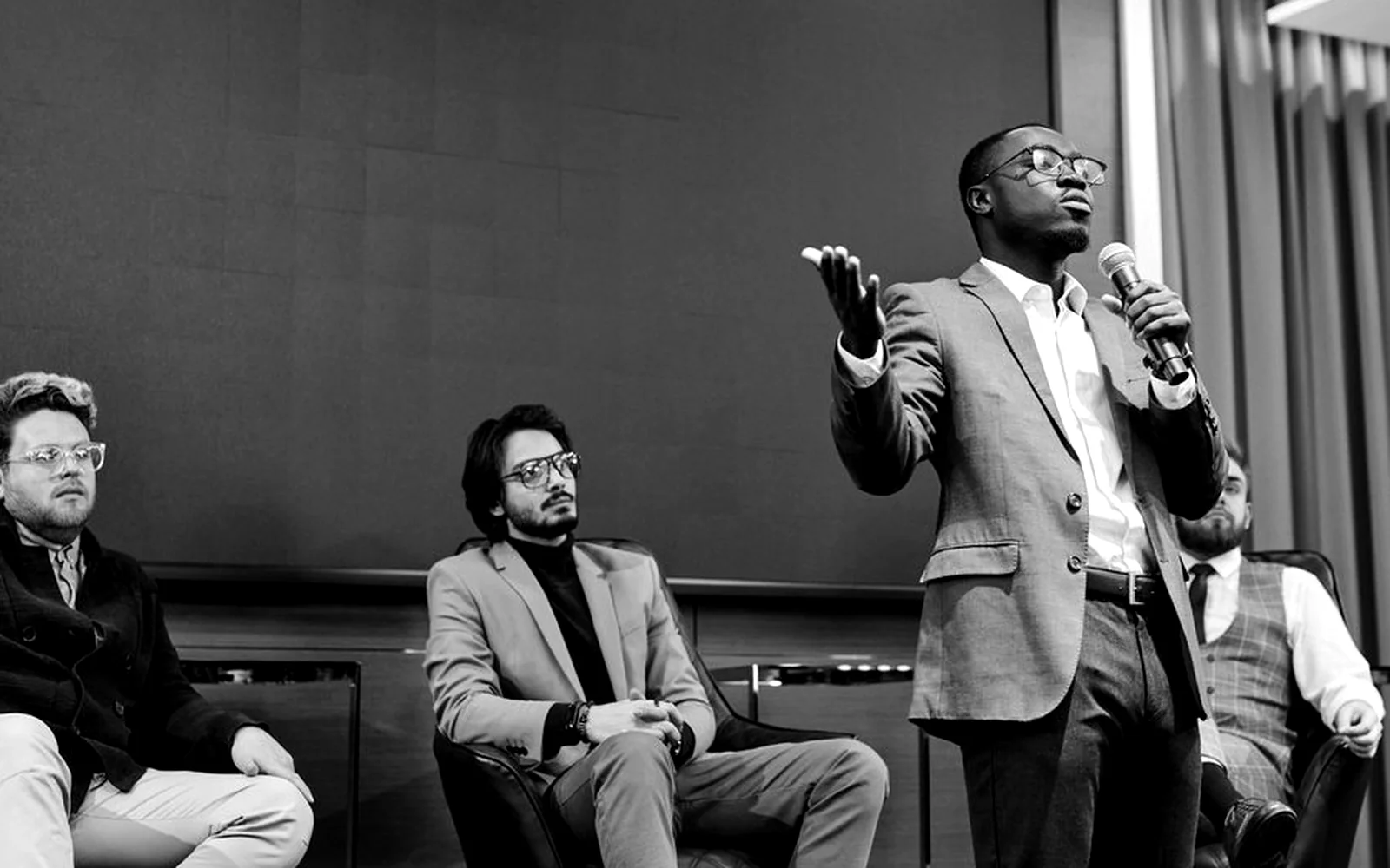 Business attendees in a professional summit discussion