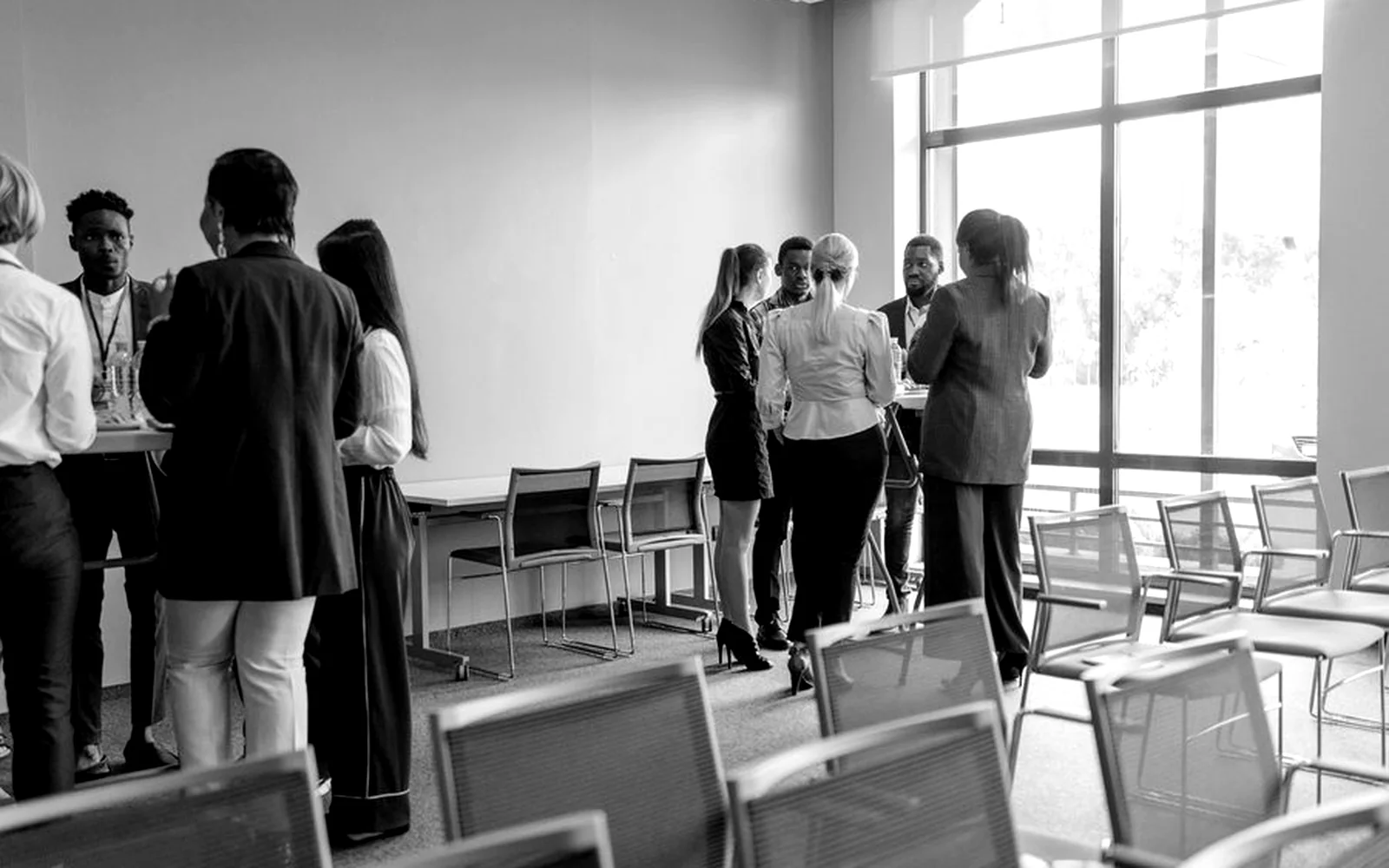Professional people discussing venue requirements